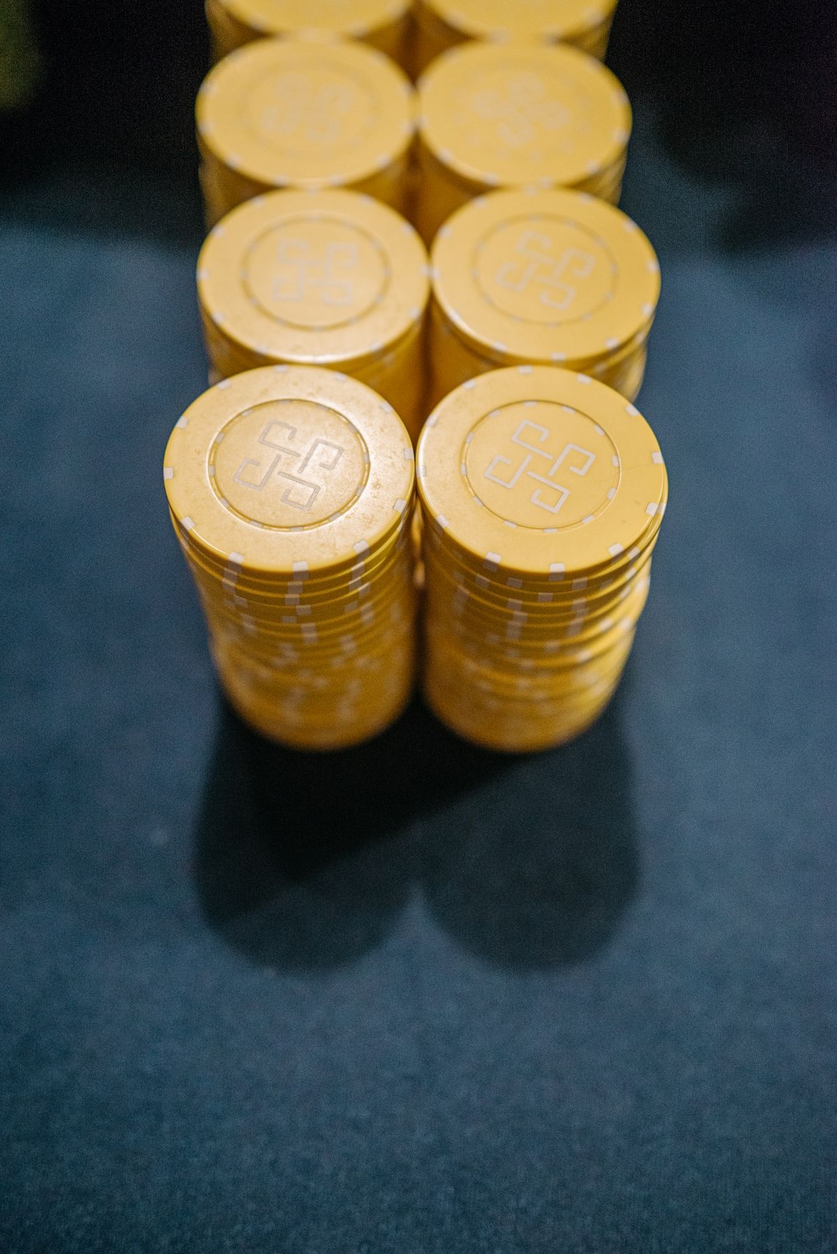 Poker tournament table with chip stacks